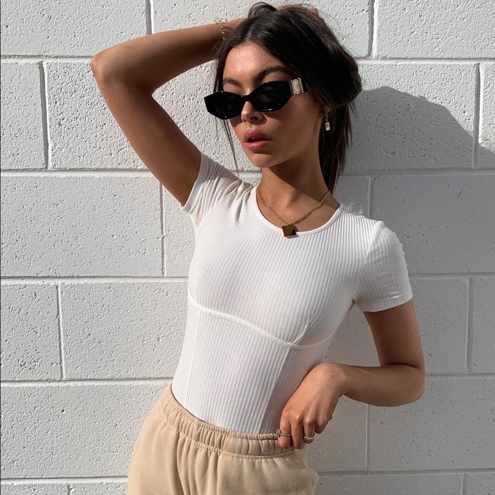 Moving mountains bodysuit in beige size 4
